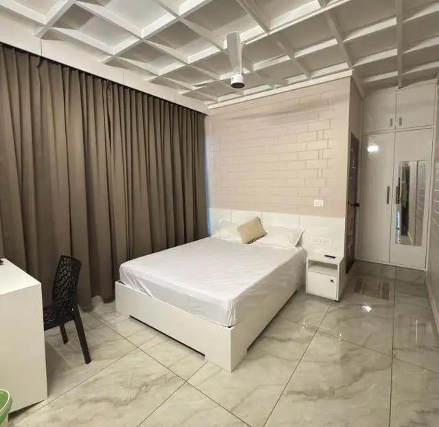 Spacious bedroom with king-size bed at Mount 360 Resort
