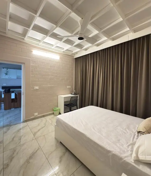 Spacious bedroom with king-size bed at Mount 360 Resort