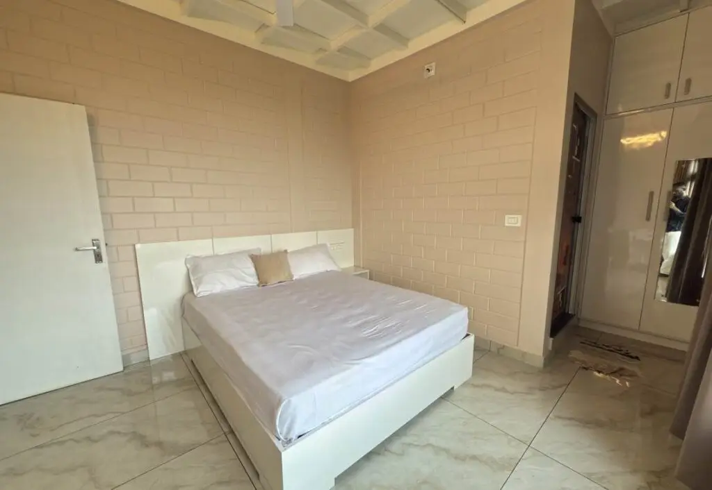 Spacious bedroom with king-size bed at Mount 360 Resort