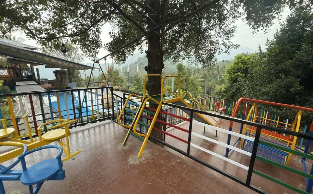 Outdoor swing set at Mount 360 Degree Resort, koodaranji, Kerala